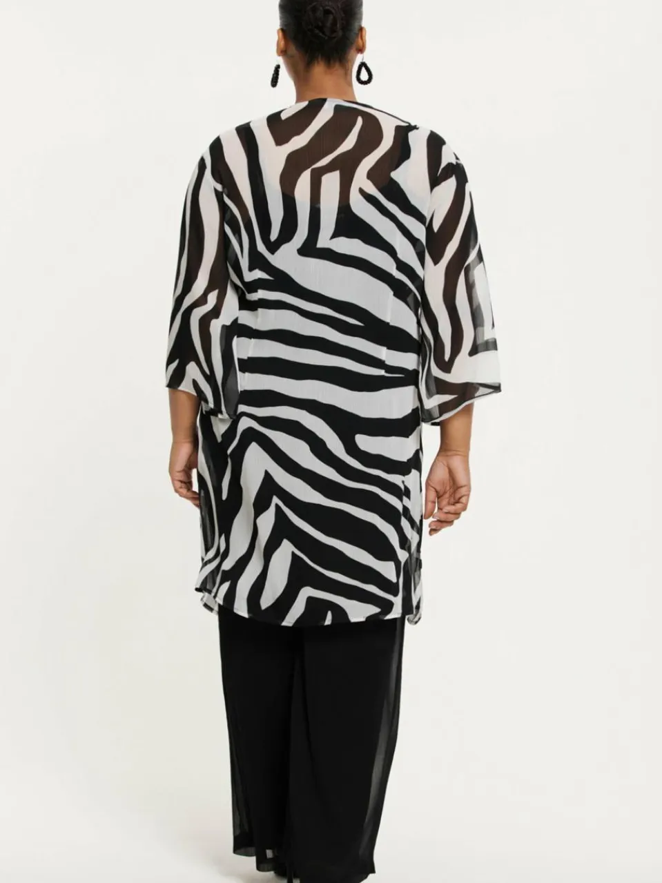 YOEK Blusen<Damen Strickjacke schwarz bedruckt