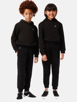 Lacoste Jungen<Jungen Hose schwarz uni